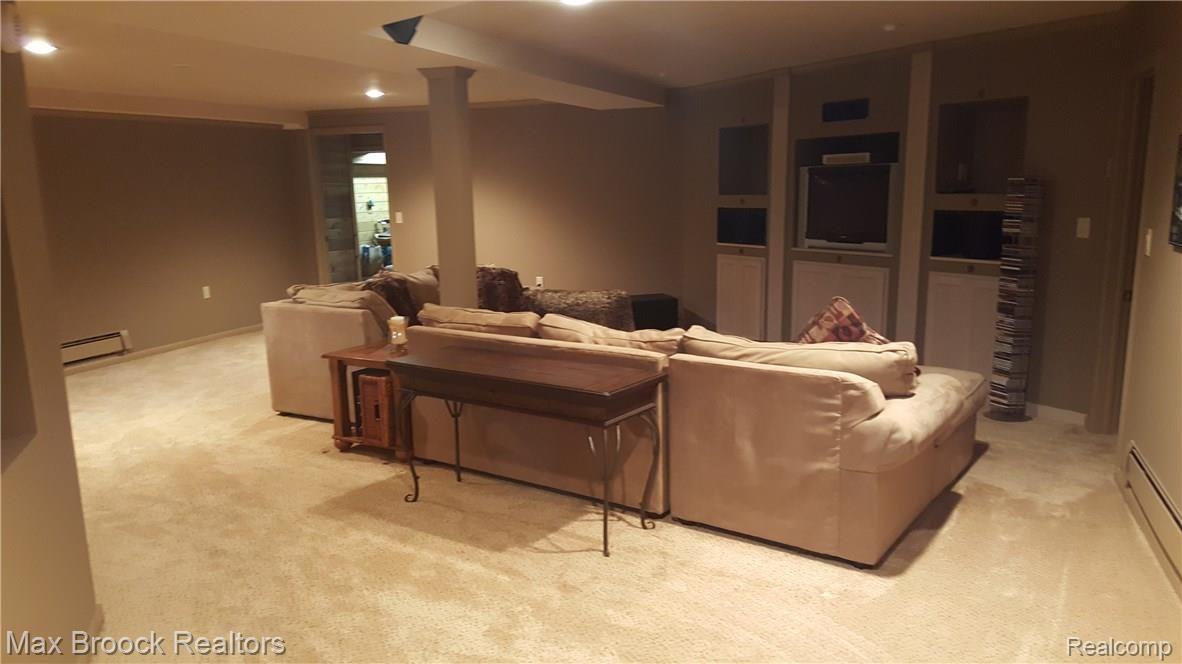 1879 Packer Road Bloomfield Hills, MI 48302 - Photo 16 of 30 Finshed lower level media and recreation room warm and cozy