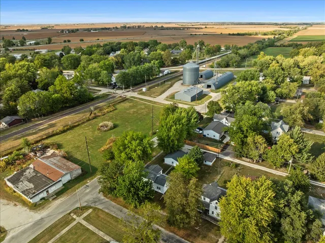 an aerial view of a house with a garden