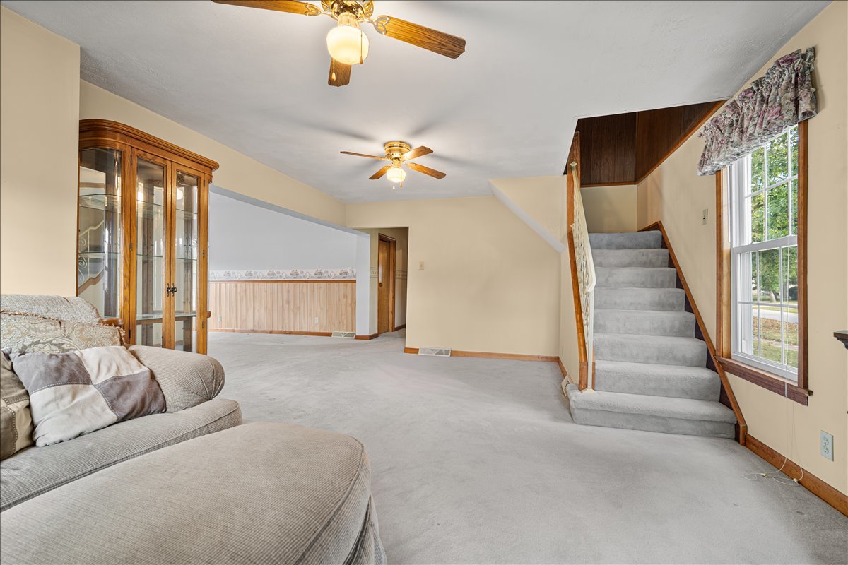 200 North Front Street Odell, IL 60460 - Photo 8 of 40 a living room with furniture and a chandelier