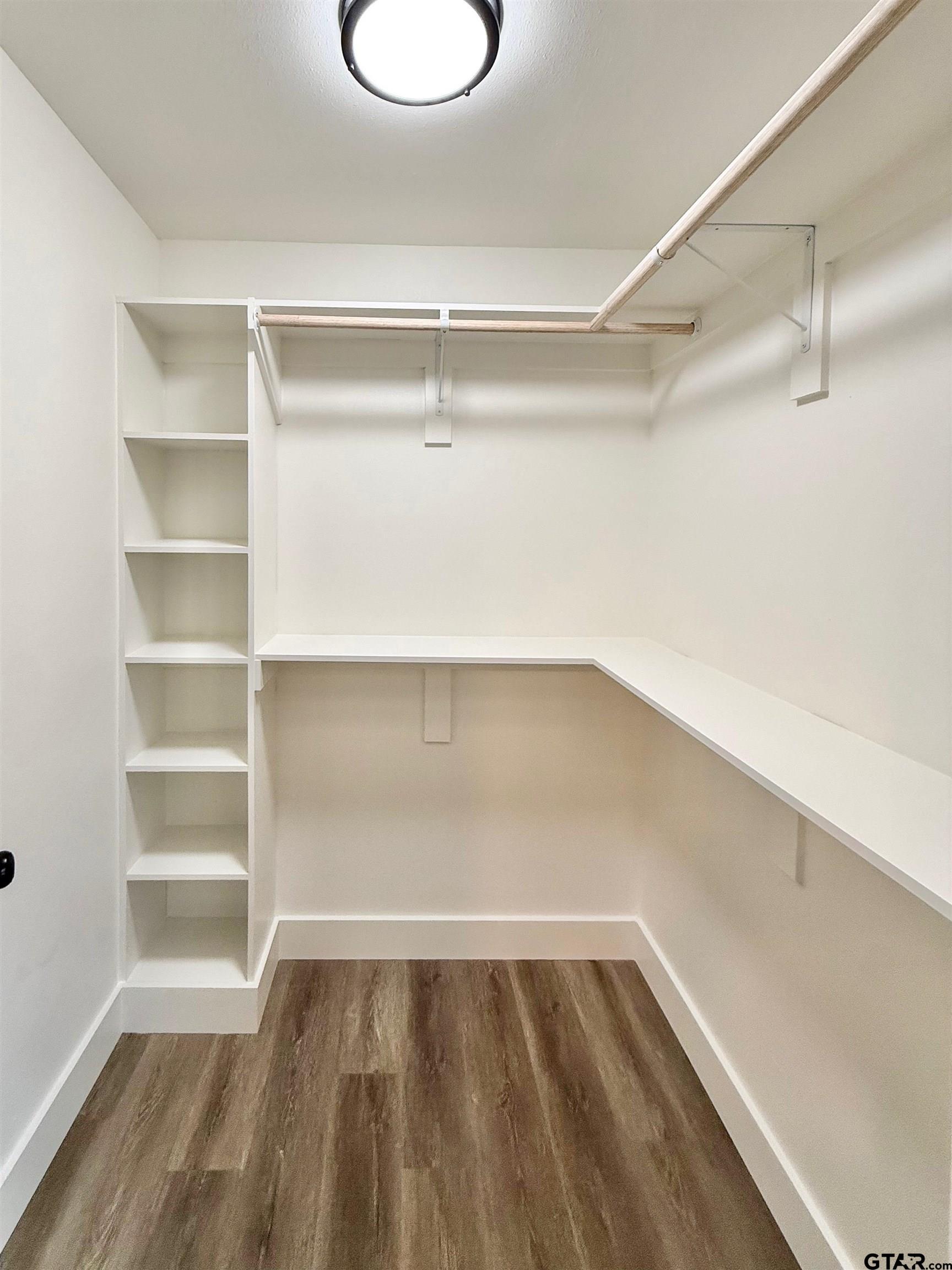 412 Garver Street Pittsburg, TX 75686 - Photo 5 of 11 a view of an empty walk in closet