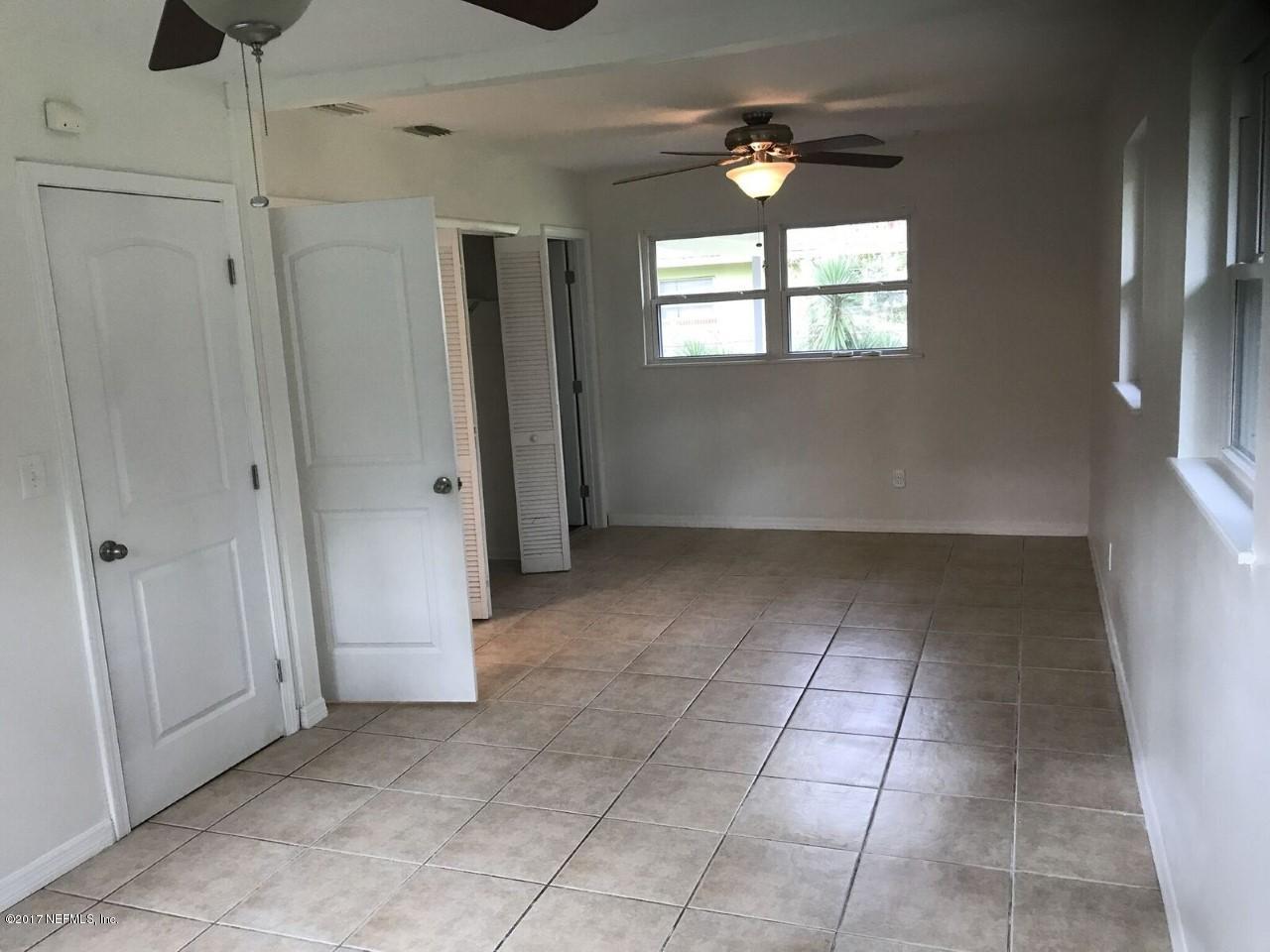 5249 Damascus Road South Jacksonville, FL 32207 - Photo 6 of 9 a view of an empty room with a window