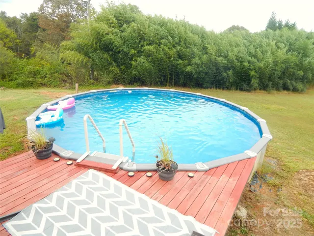 a view of a swimming pool with an outdoor space