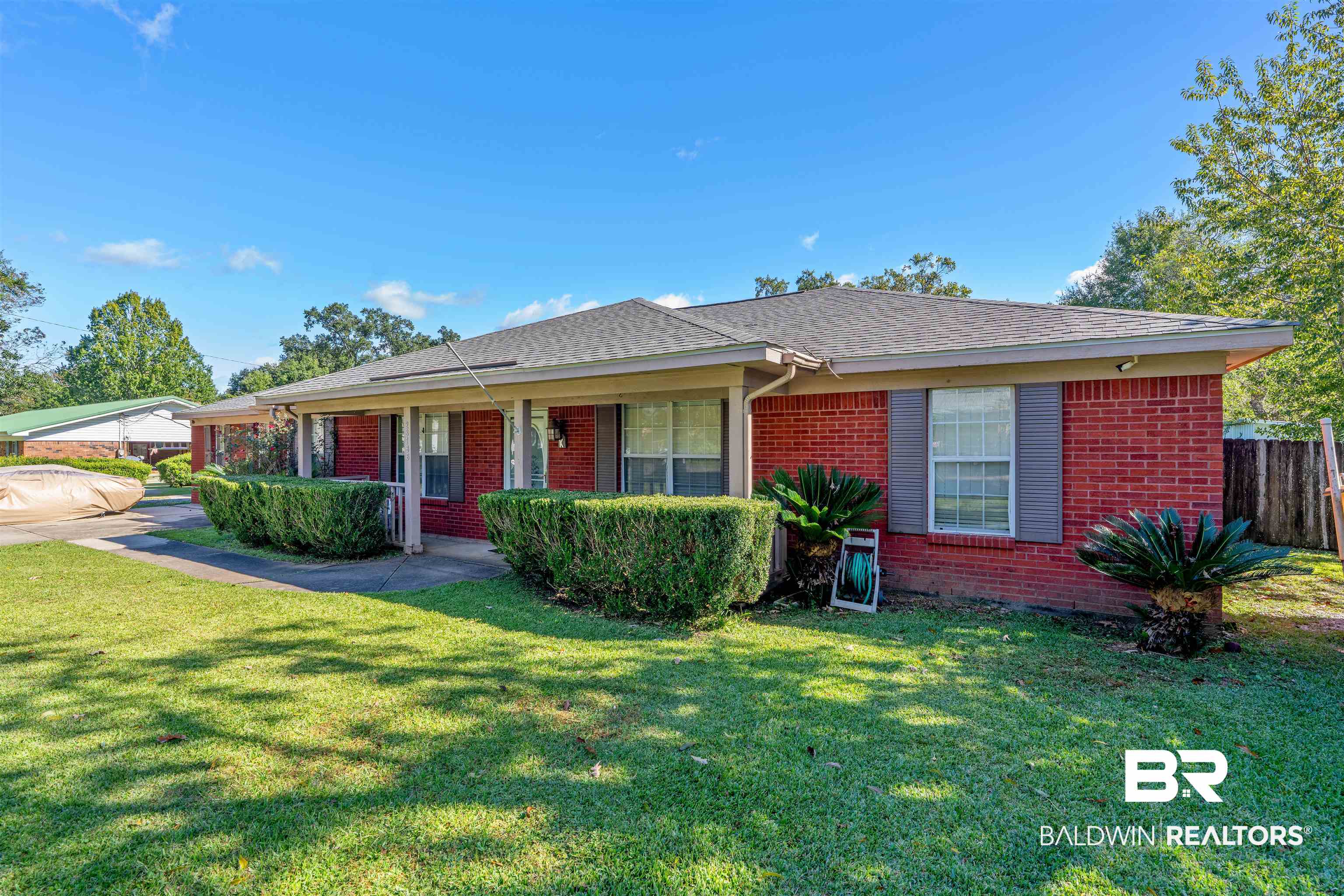 23186 Pecan Street Robertsdale, AL 36567 - Photo 2 of 36 Ranch-style house featuring brick siding and roof with shingles