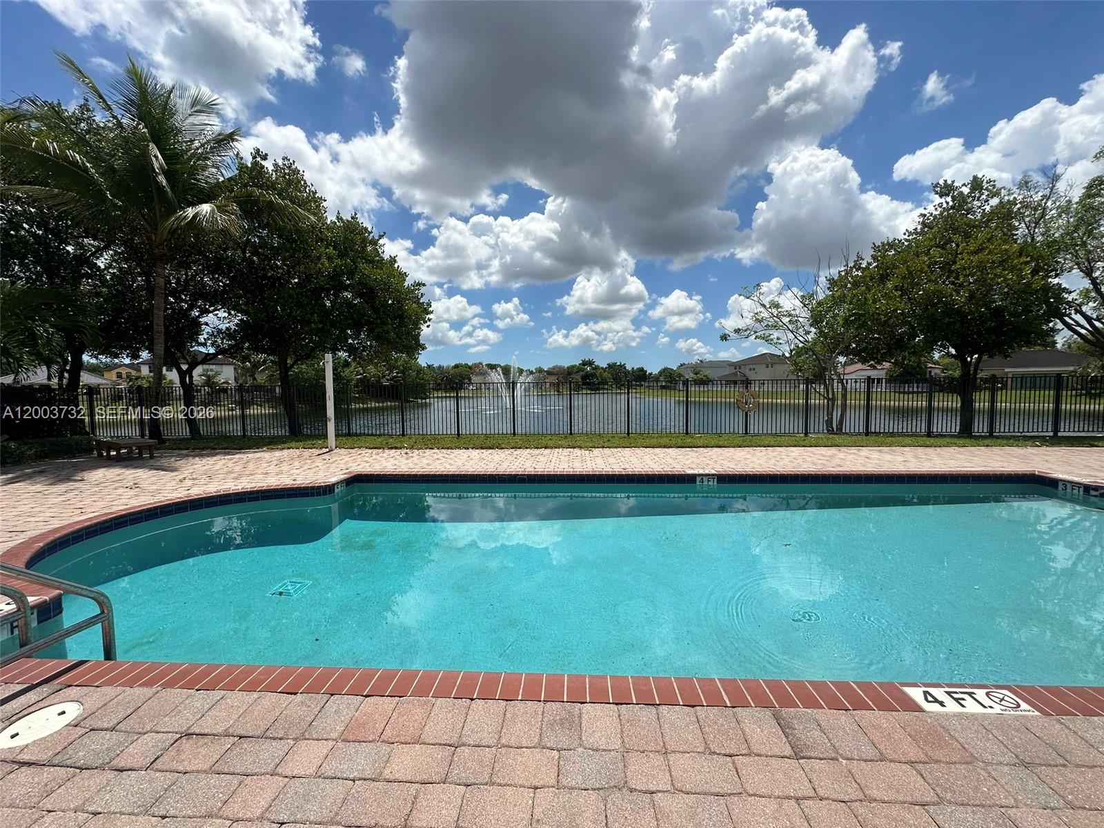 16537 Southwest 78th Terrace Miami, FL 33193 - Photo 29 of 34 a view of swimming pool with a yard