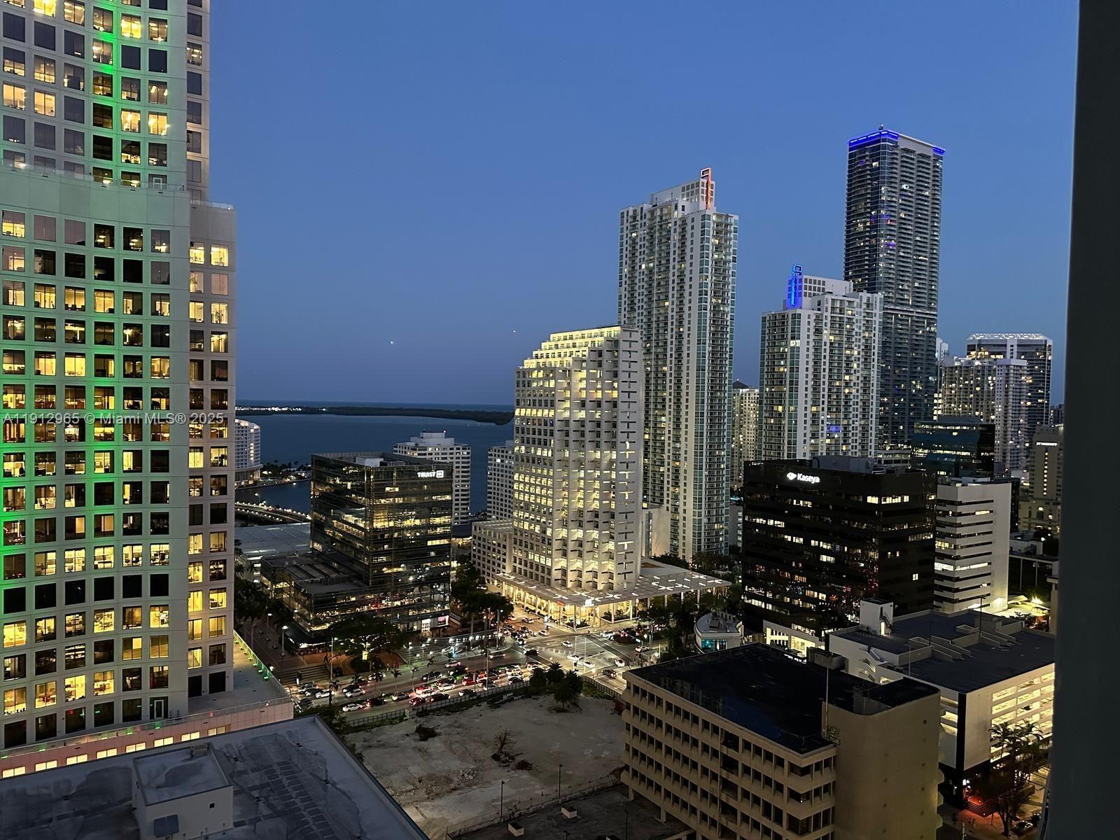 68 Southeast 6th Street, Unit 2205 Miami, FL 33131 - Photo 14 of 28 a city view with tall buildings