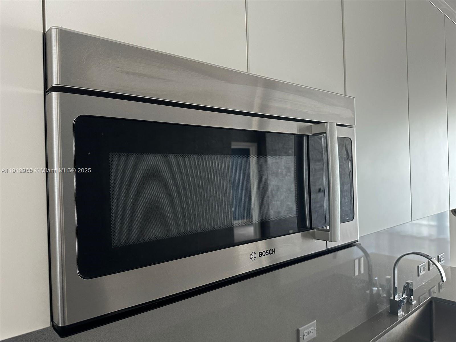 68 Southeast 6th Street, Unit 2205 Miami, FL 33131 - Photo 16 of 28 a close view of sink