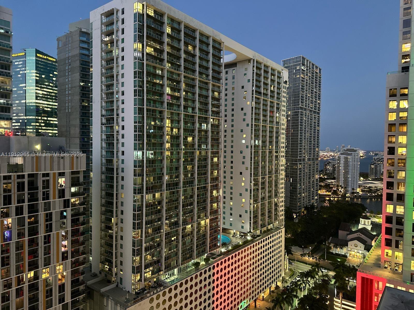 68 Southeast 6th Street, Unit 2205 Miami, FL 33131 - Photo 17 of 28 a view of a tall building