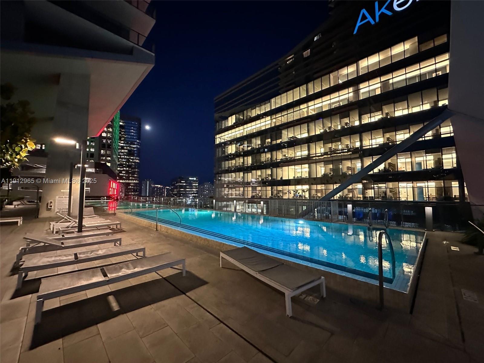 68 Southeast 6th Street, Unit 2205 Miami, FL 33131 - Photo 19 of 28 a outdoor space with lots of lights