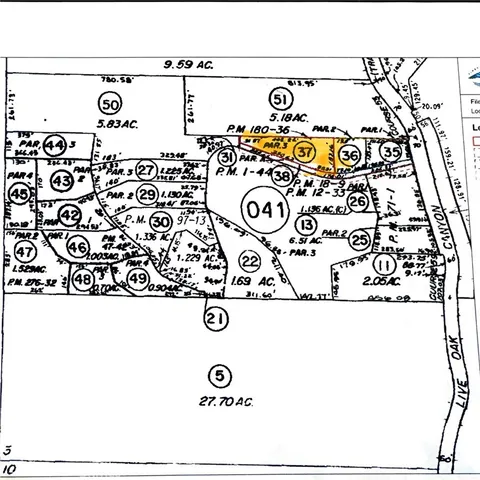 an aerial view of house with yard