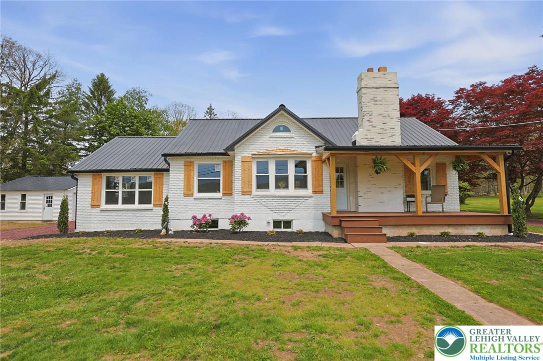121 Ben Titus Road Tamaqua, PA 18252 - Photo 2 of 48 a front view of a house with a yard
