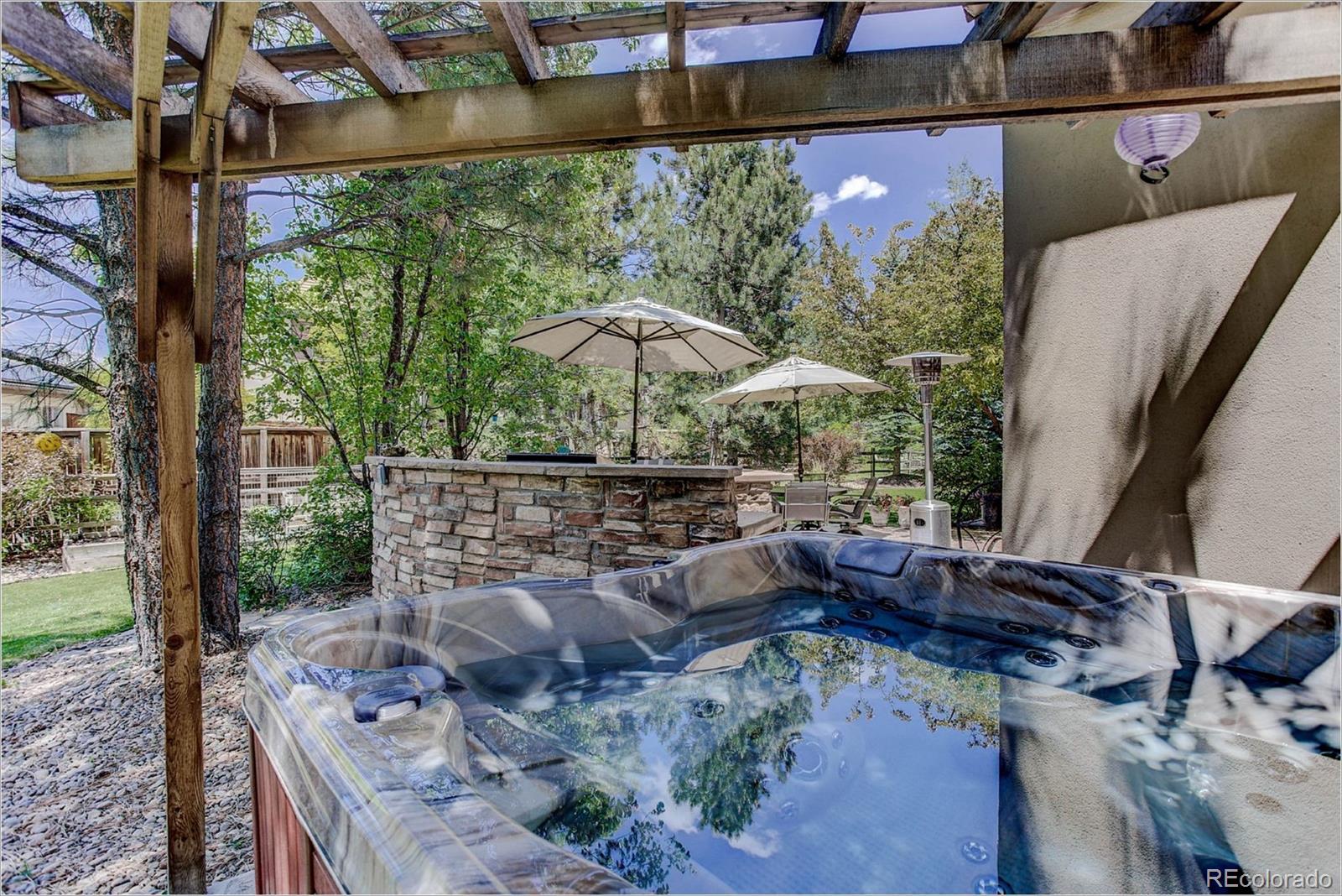9425 South Shadow Hill Circle Lone Tree, CO 80124 - Photo 34 of 35 a view of a balcony with furniture