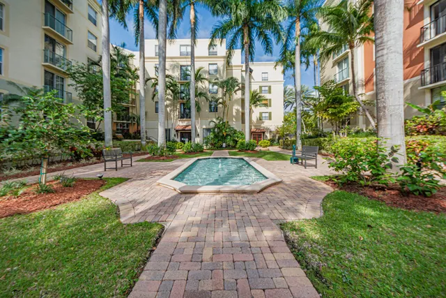a view of a backyard with a patio