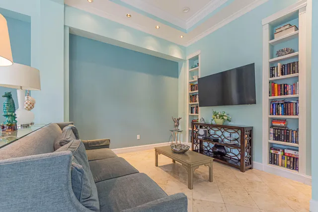 a view of a dining room with furniture and window