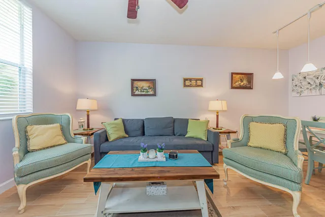 a living room with furniture and a couch