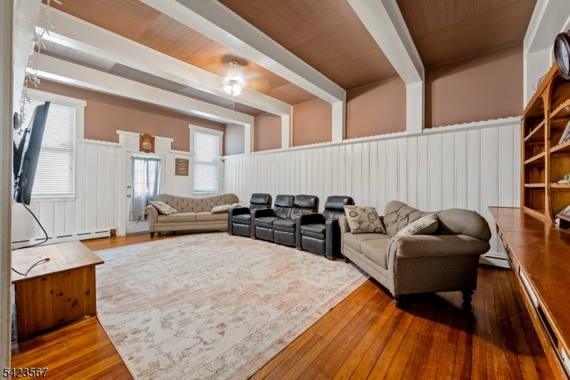 2 Prospect Street Mount Arlington, NJ 07856 - Photo 4 of 24 a living room with furniture and a couch