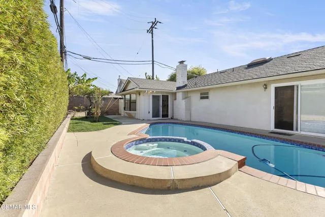 a front view of a house with entertaining space
