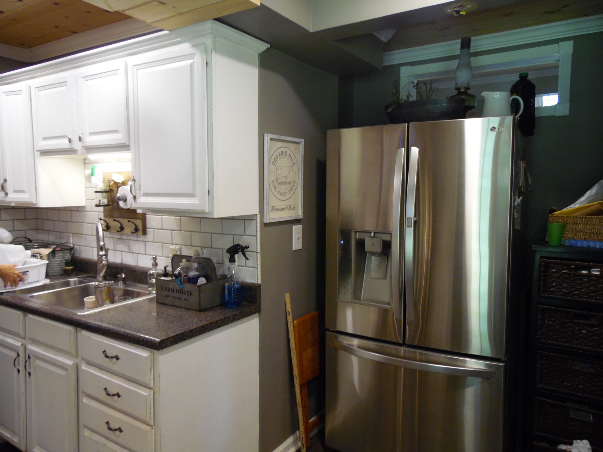 833 Rip Steele Road Columbia, TN 38401 - Photo 8 of 23 a kitchen with metallic refrigerator a sink and cabinets