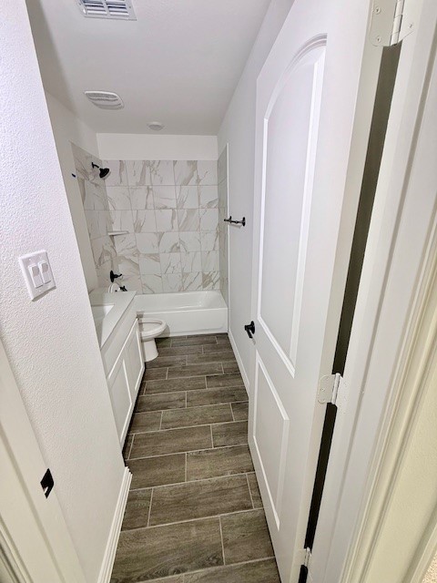 1602 Grassy Pond Road Forney, TX 75126 - Photo 18 of 21 a view of a hallway with wooden floor and staircase