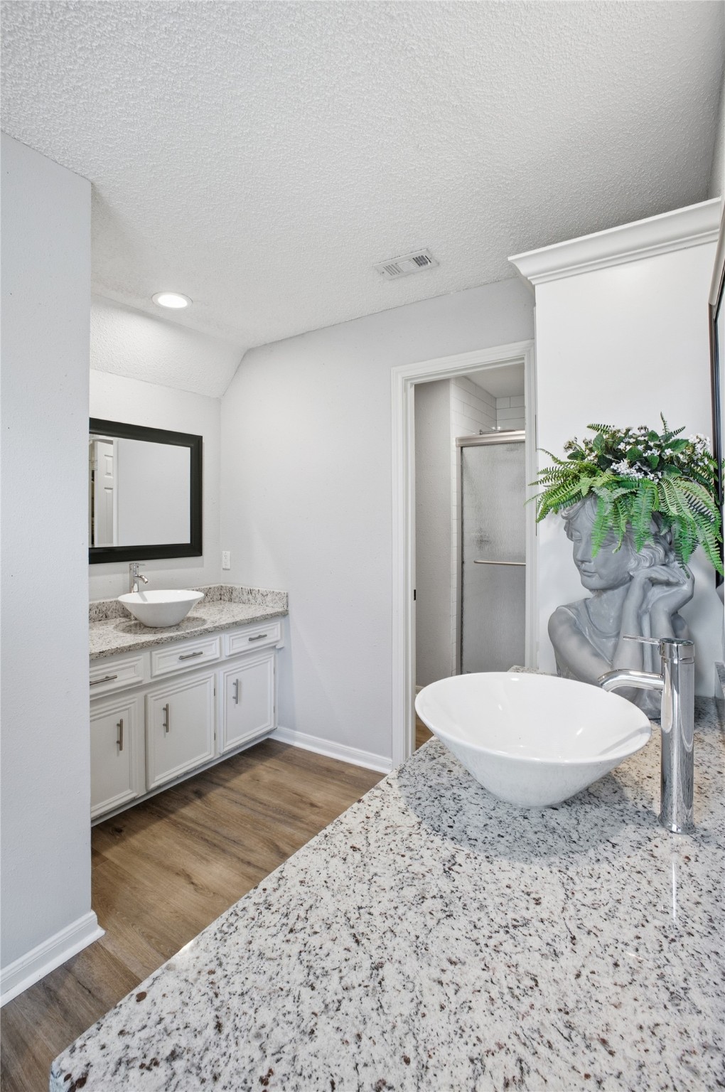 24107 Norchester Way Spring, TX 77389 - Photo 27 of 33 a living room with a toilet and a potted plant