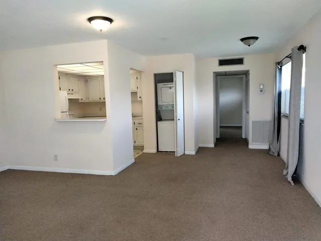 an empty room with a bathroom