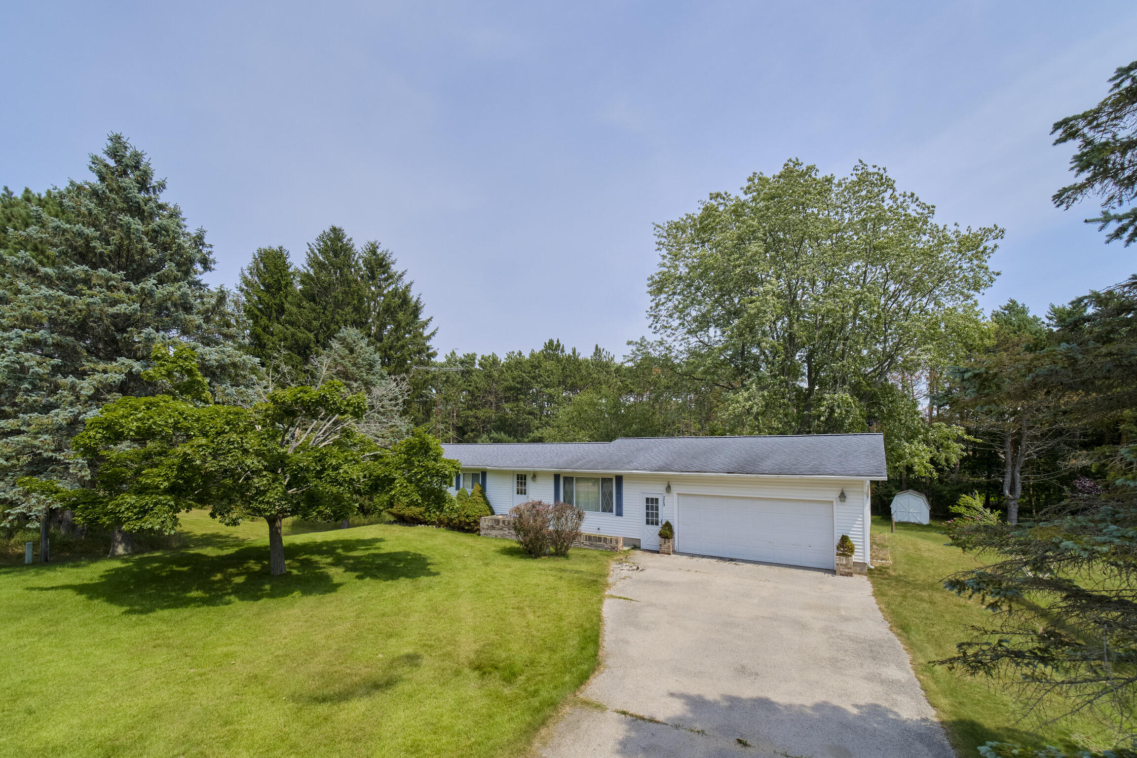 2065 Cherry Road Manistee, MI 49660 - Photo 2 of 14 Front of Home