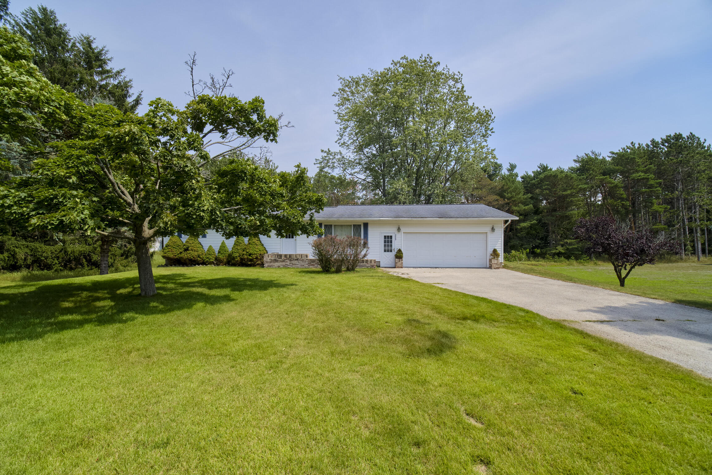2065 Cherry Road Manistee, MI 49660 - Photo 3 of 14 Front Lawn