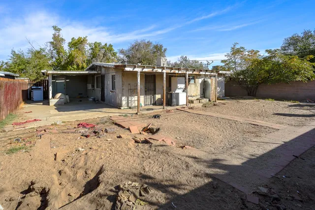a view of a backyard of the house