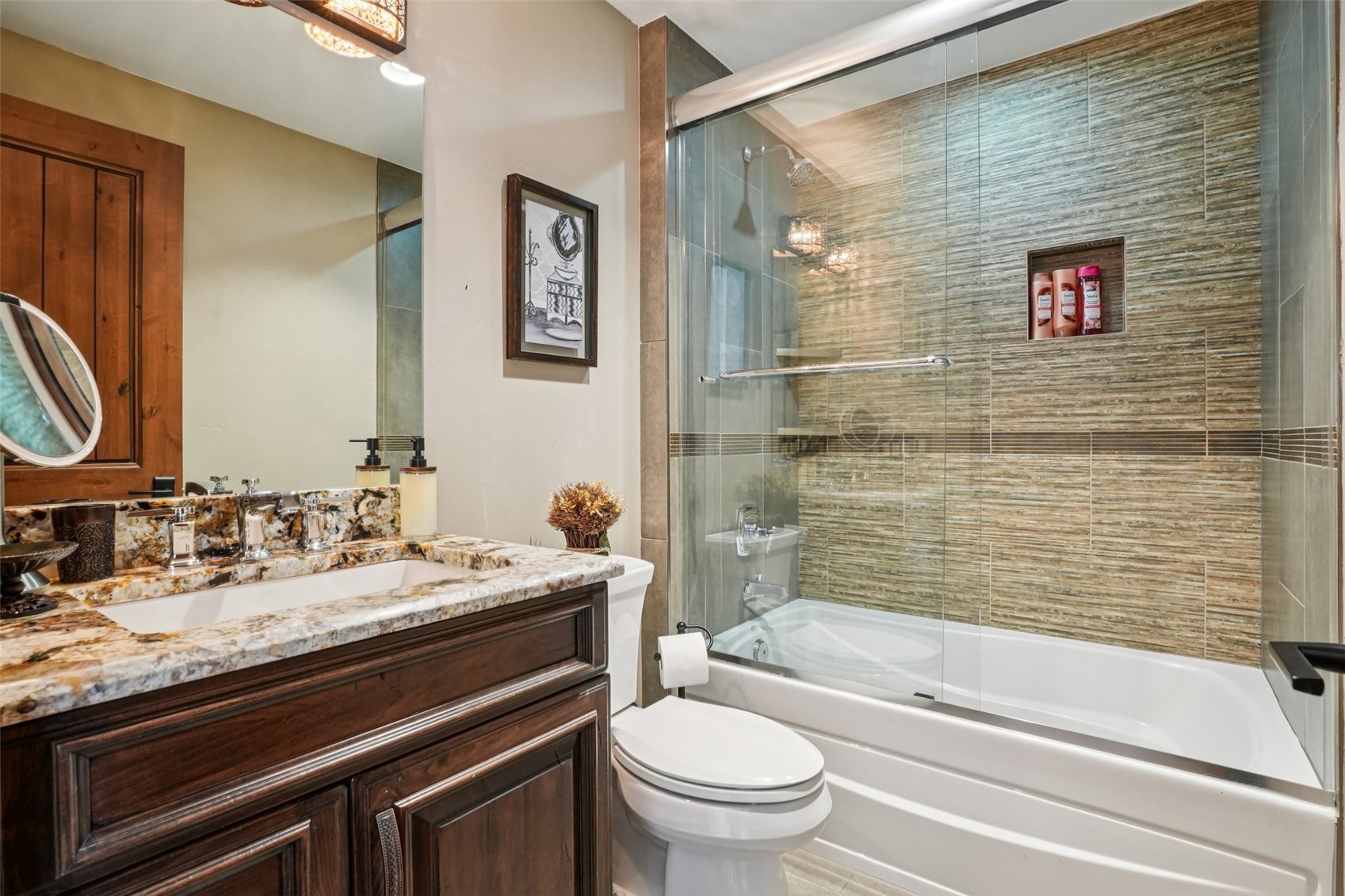 104 Talon Circle Silverthorne, CO 80498 - Photo 42 of 50 a bathroom with a granite countertop sink toilet and shower