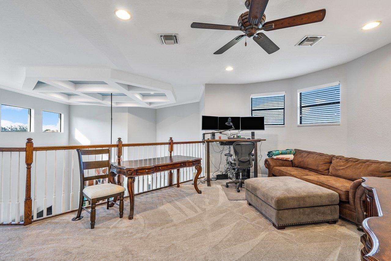 9283 Equus Circle Boynton Beach, FL 33472 - Photo 23 of 48 a living room with furniture and a ceiling fan