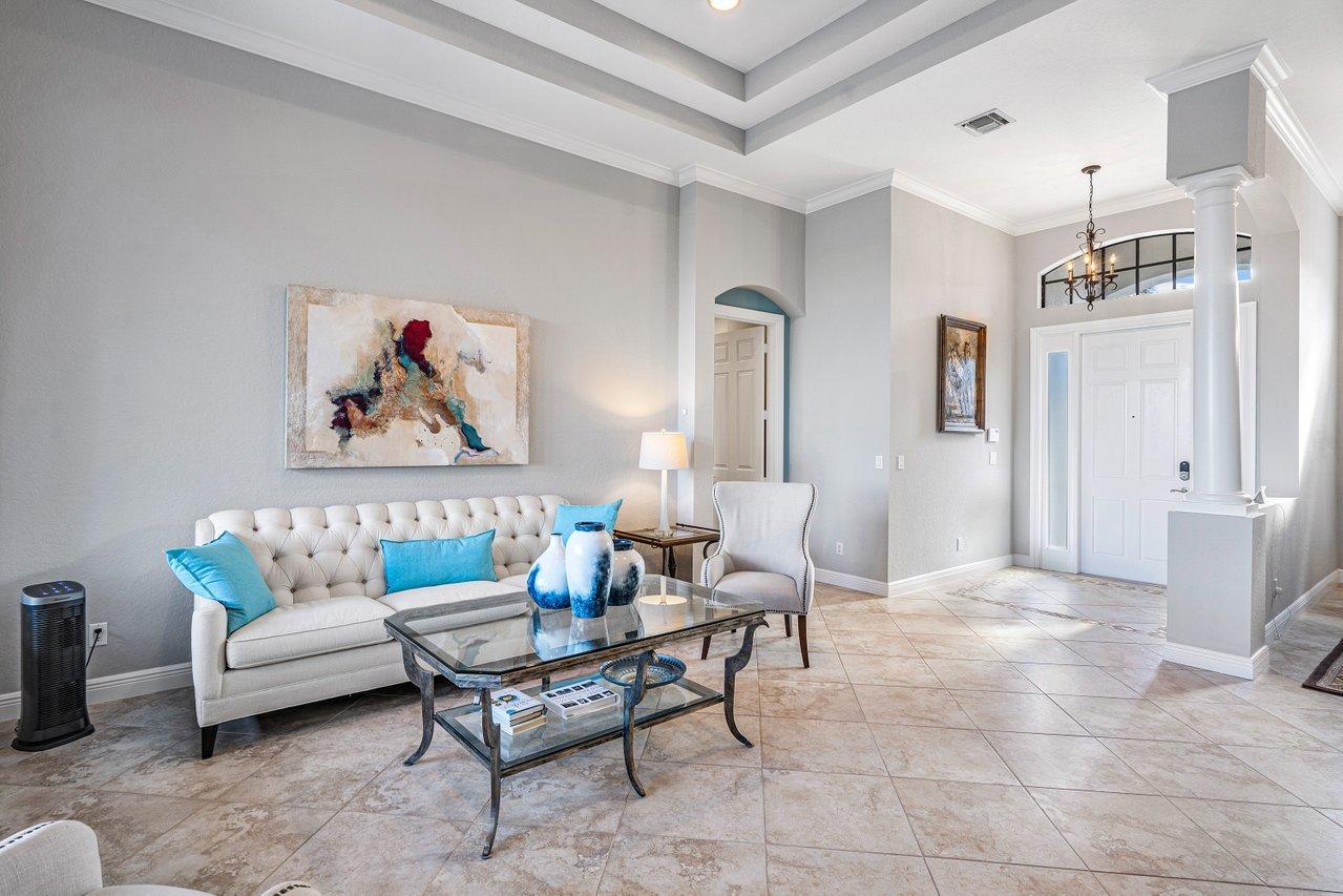 9283 Equus Circle Boynton Beach, FL 33472 - Photo 7 of 48 a living room with furniture and a table