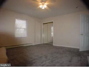 129 Breton Road Brick, NJ 08723 - Photo 4 of 8 a view of an empty room with a window