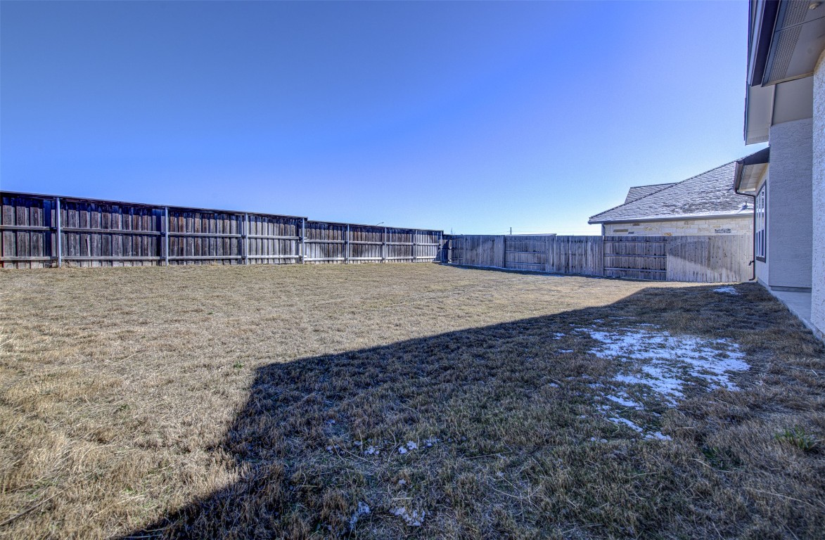 822 Wild Pecan Loop Buda, TX 78610 - Photo 33 of 33 View of fenced backyard