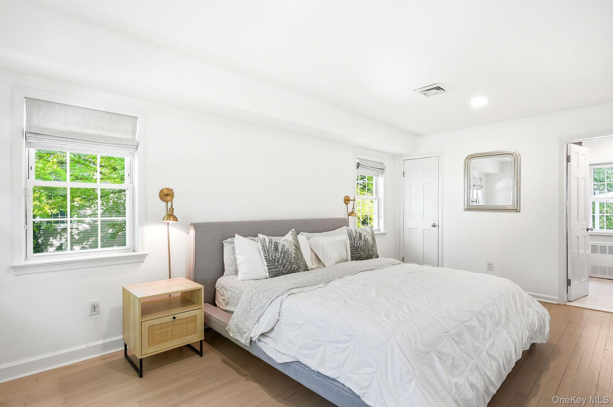7 Morehead Drive Rye, NY 10580 - Photo 15 of 34 a bedroom with a bed and a window