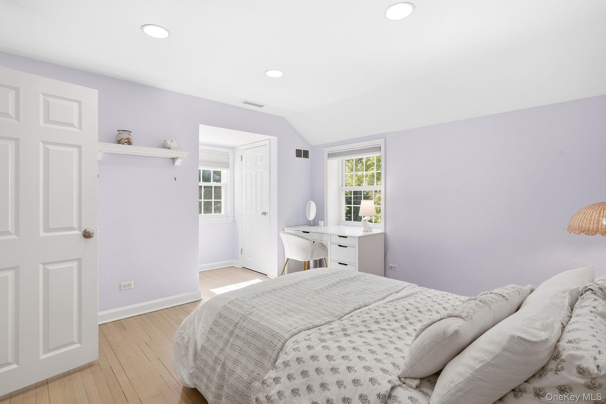 7 Morehead Drive Rye, NY 10580 - Photo 20 of 34 a bedroom with a bed and a window