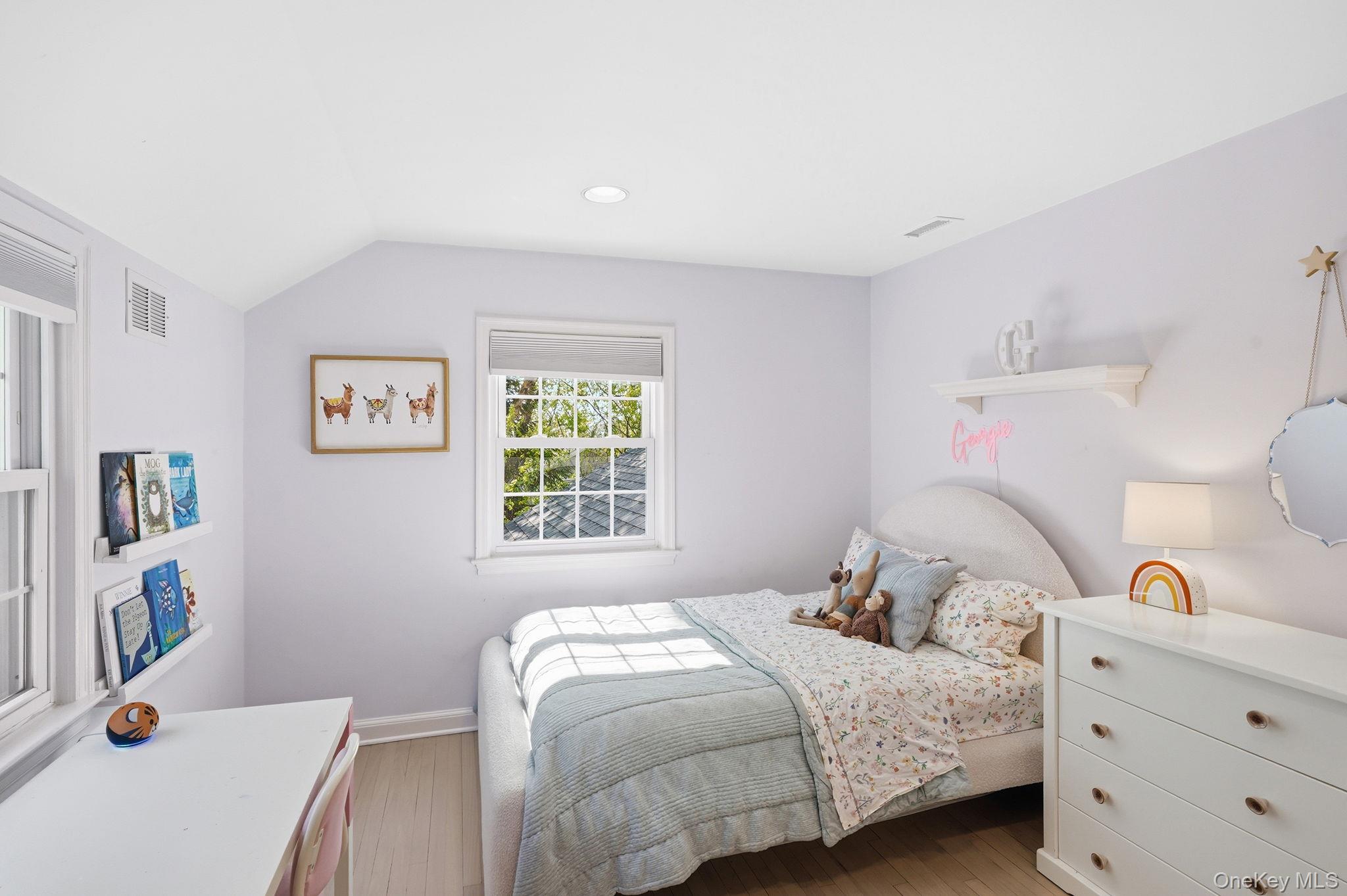 7 Morehead Drive Rye, NY 10580 - Photo 22 of 34 a bedroom with a bed and a window