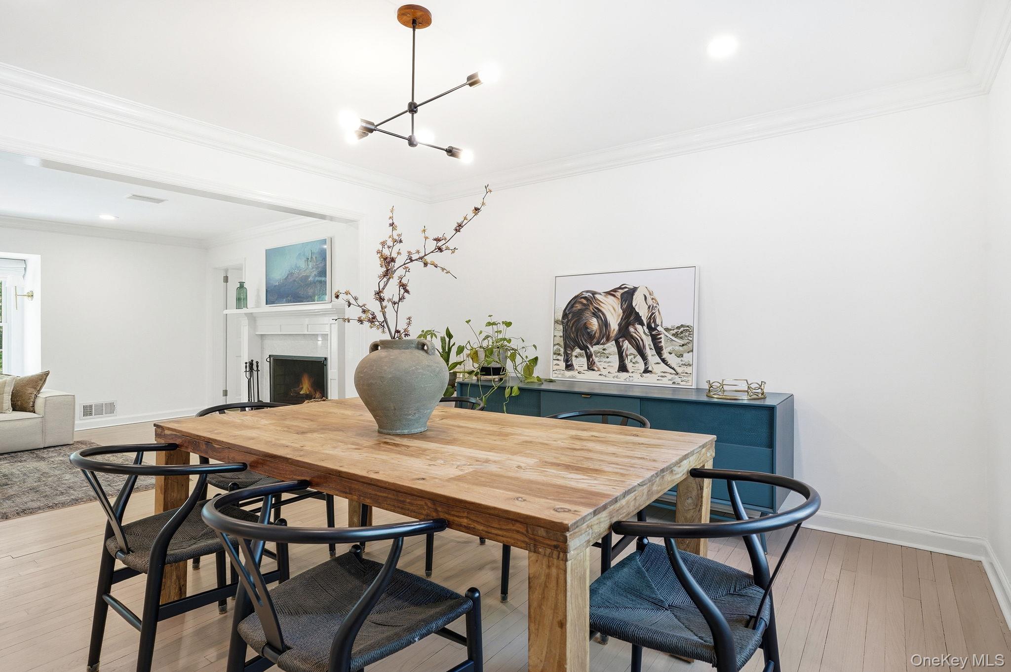 7 Morehead Drive Rye, NY 10580 - Photo 6 of 34 a view of a dining room with furniture and wooden floor