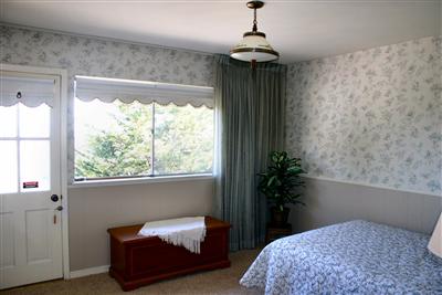 36 Ridgewood Drive San Rafael, CA 94901 - Photo 8 of 11 a bedroom with bed and a window
