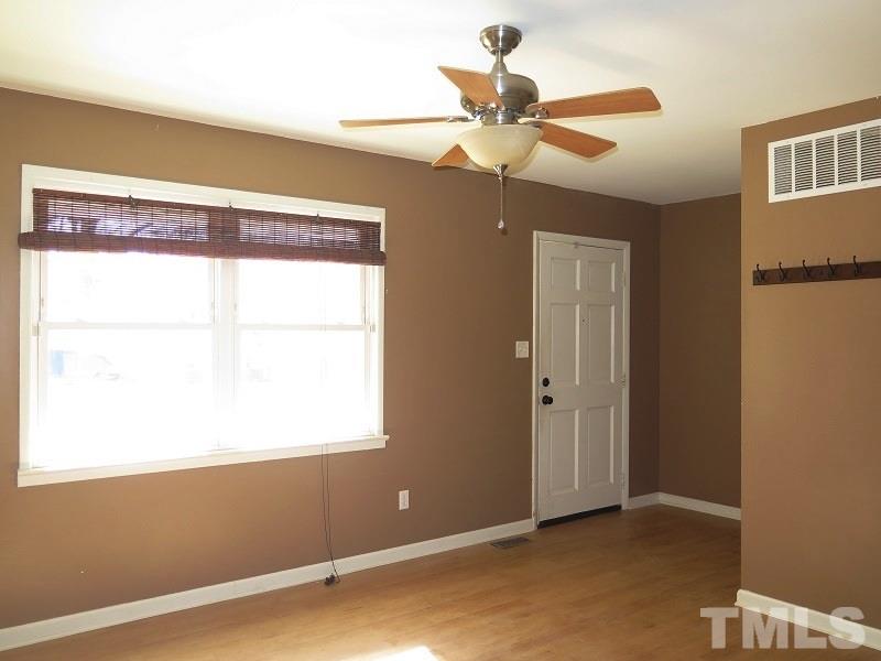 632 Buck Jones Road Raleigh, NC 27606 - Photo 2 of 20 a view of an empty room with a window