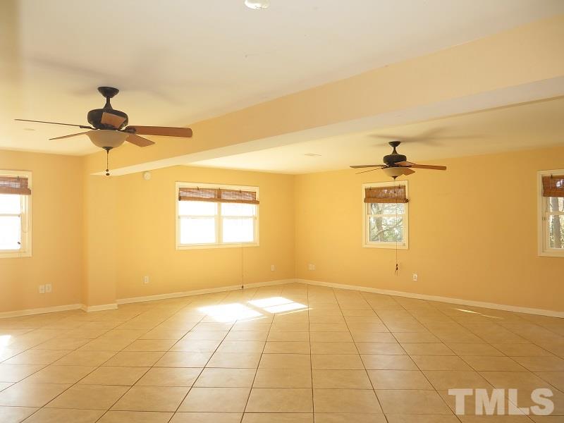 632 Buck Jones Road Raleigh, NC 27606 - Photo 12 of 20 a view of an empty room and a window