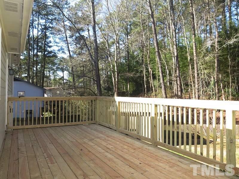 632 Buck Jones Road Raleigh, NC 27606 - Photo 18 of 20 a view of a wooden roof deck