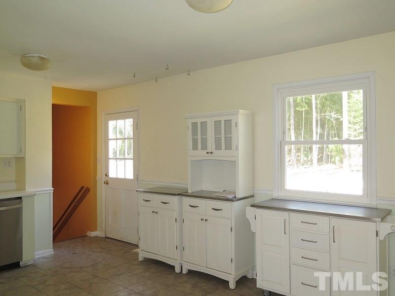 632 Buck Jones Road Raleigh, NC 27606 - Photo 5 of 20 an empty room with windows