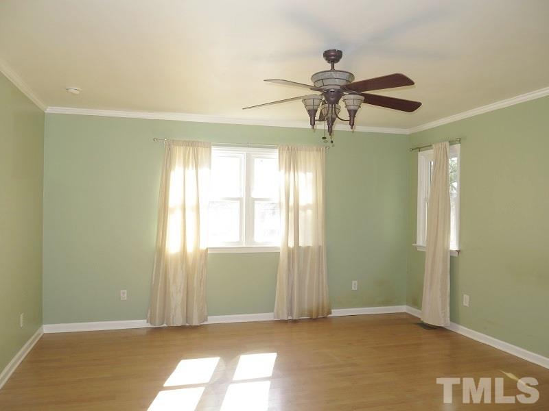 632 Buck Jones Road Raleigh, NC 27606 - Photo 7 of 20 a view of an empty room with a window