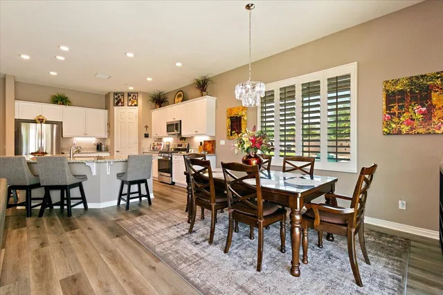 a view of a dining room with furniture