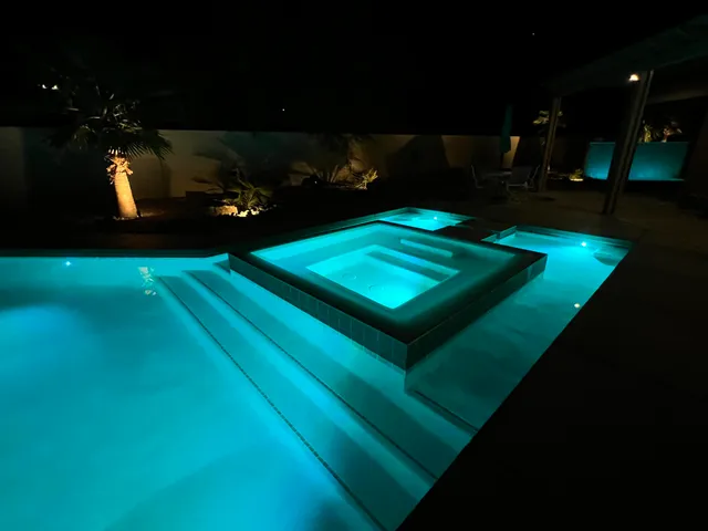 a view of a golf course with a swimming pool