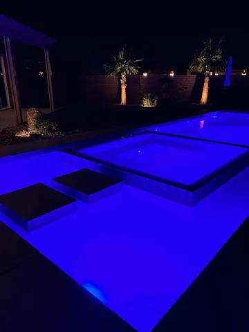 a room with red lamp and lamp