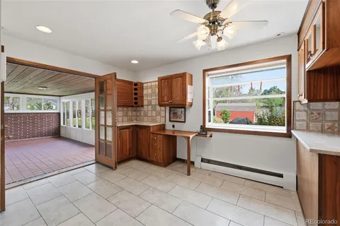 a view of kitchen with furniture and window