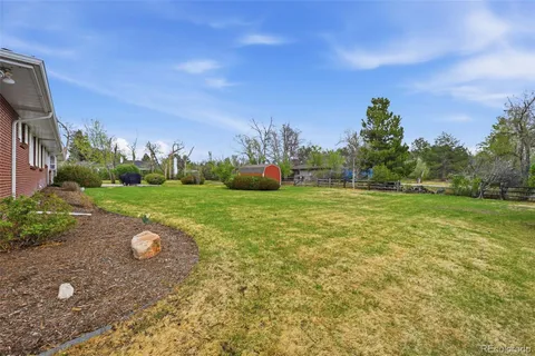 a view of a garden with an outdoor space