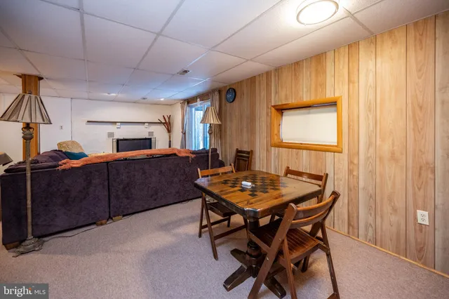 a view of utility room and bedroom