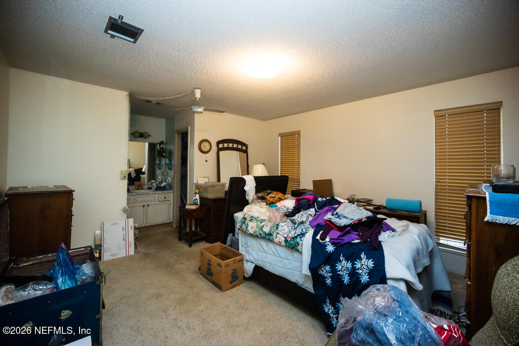 6140 Thistlewood Road Jacksonville, FL 32277 - Photo 21 of 35 Master Bedroom