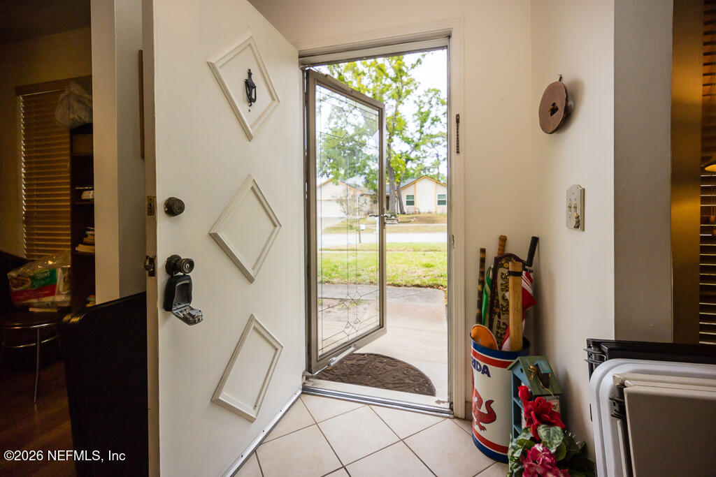 6140 Thistlewood Road Jacksonville, FL 32277 - Photo 8 of 35 Foyer View 1